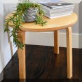 F16. Round contemporary side table. 